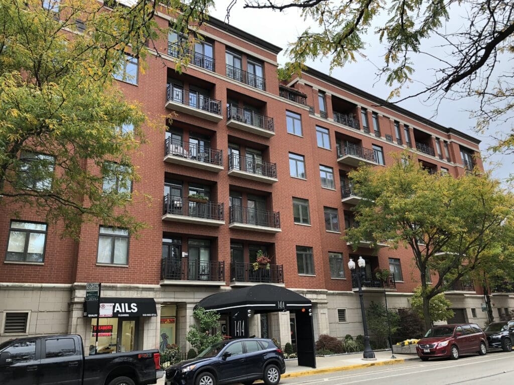 Wide shot of the exterior of a metropolitan apartment complex